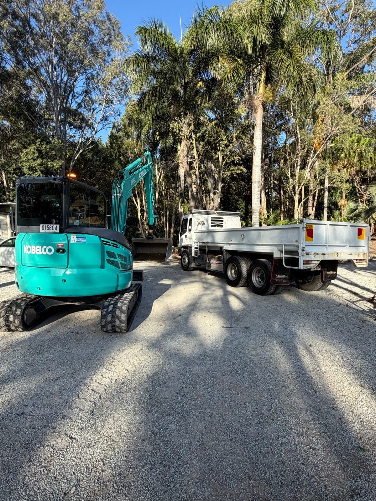 QES excavator and tipper working together on a gravel job (previous work)