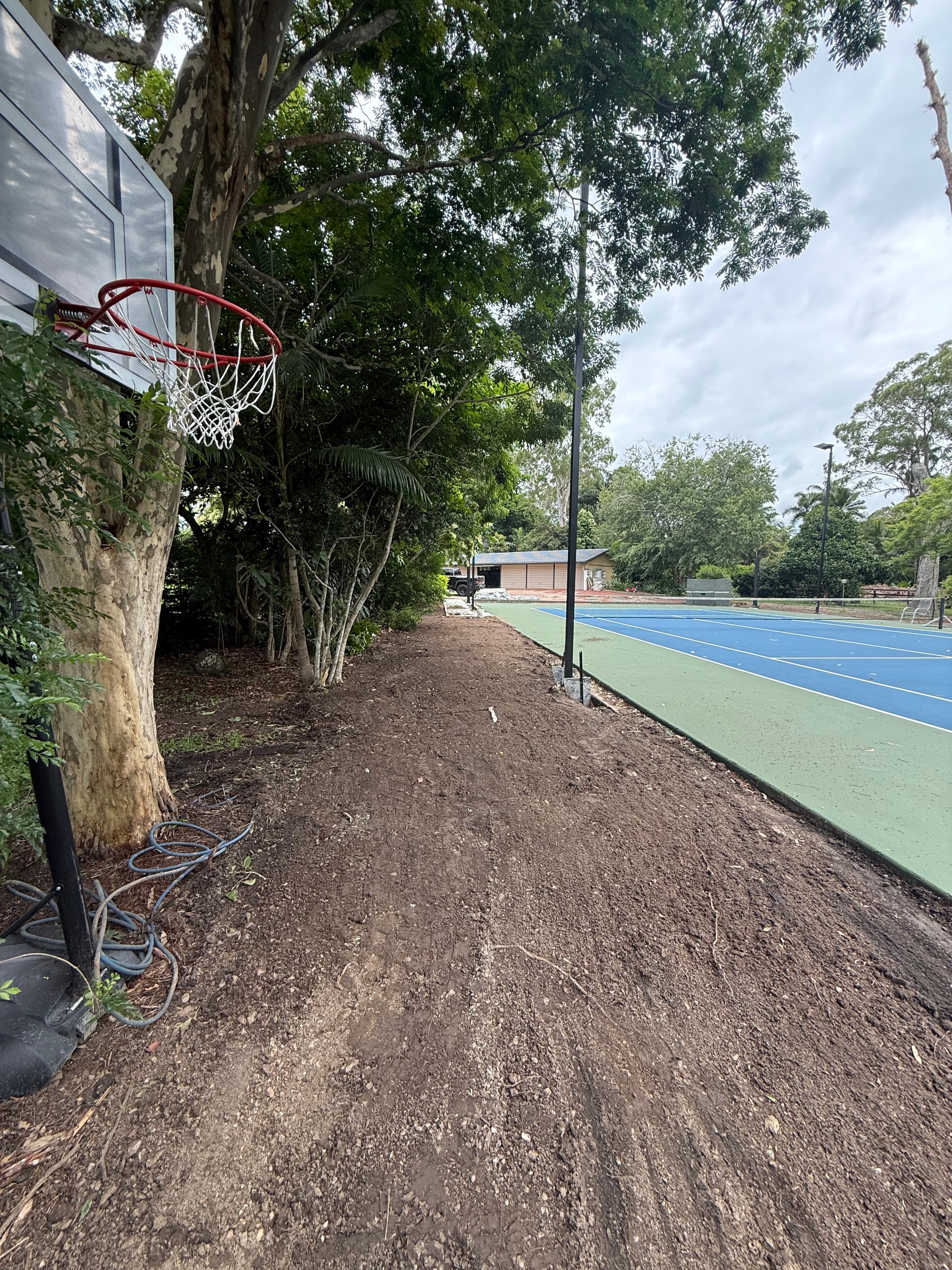 Site clearing and grading around sports court, Gold Coast